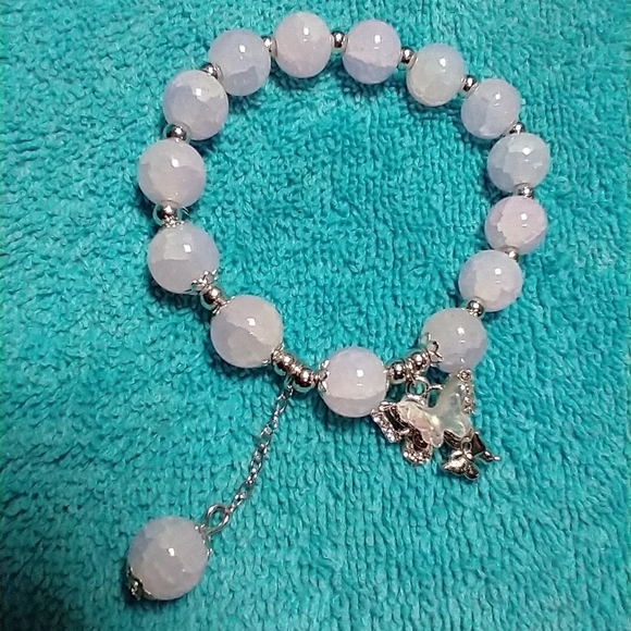 Silvertone white beaded aurora butterfly stretch bracelet - Picture 1 of 4